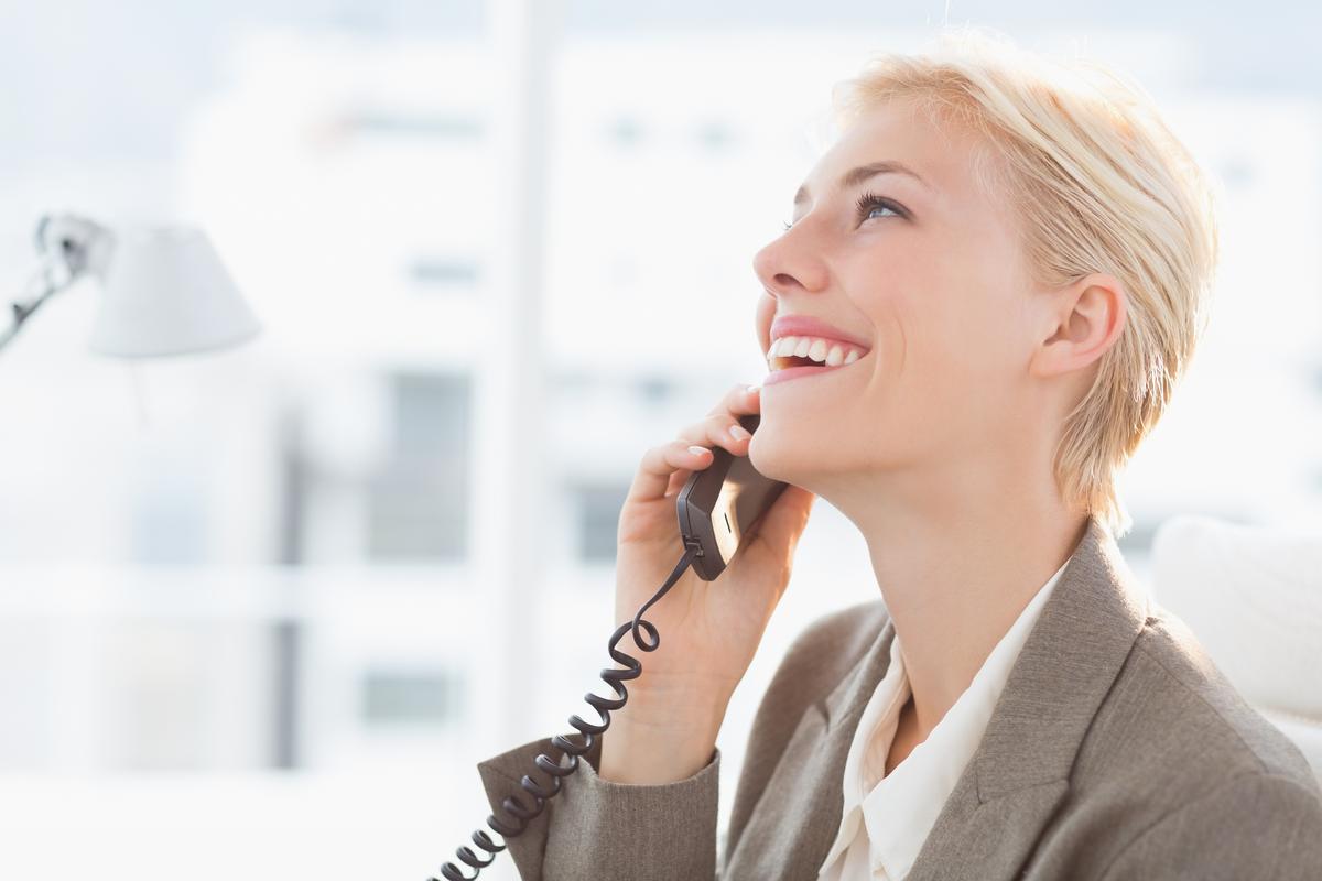 Woman talking on phone and smiling